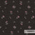 Donkerbruine dessinstof met roze bloemmotief van Sahco, gemaakt van gerecycled polyester en nylon, geschikt voor interieurtoepassingen.