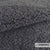 Close-up van wollige meubelstof Texel, kleur Graphite, van Casal. Slijtvast, brandvertragend en OEKO-TEX gecertificeerd.