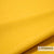 Gele Casal Dolly stof met hoge wolgehalte, brandvertragend en slijtvast, close-up van de textuur.