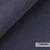 Donkere elegante meubelstof Levino van Sahco met stonewash afwerking, 91% linnen en 9% nylon, geschikt voor interieurdesign.