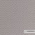 Vescom Rolla 7065.13 meubelstof met opvallend architectonisch patroon, ideaal voor intensieve projecttoepassingen in interieurontwerp.