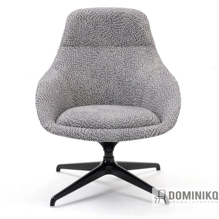 Grijze fauteuil bekleed met Kin CF1115 stof van Bute Fabrics met jacquardpatroon, op zwarte draaivoet.