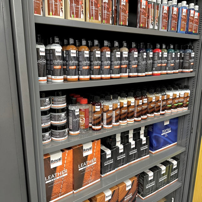 Leather Care Kit for Brushed Leather 500 ml displayed on a store shelf with other leather care products.