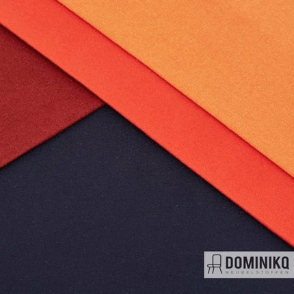 Drie overlappende stoffen van Camira Fabrics Synergy collectie in oranje, rood en zwart, geschikt voor robuuste meubeltoepassingen.