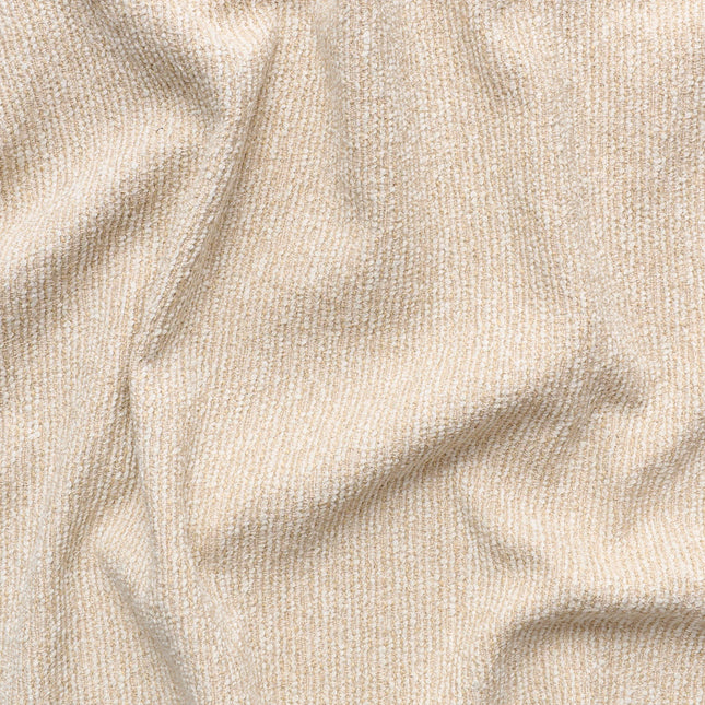 Kvadrat - Sahco - Nalia - 630 textured beige fabric close-up with sculptural tweed design, cotton-rich, splattered with warm hues.