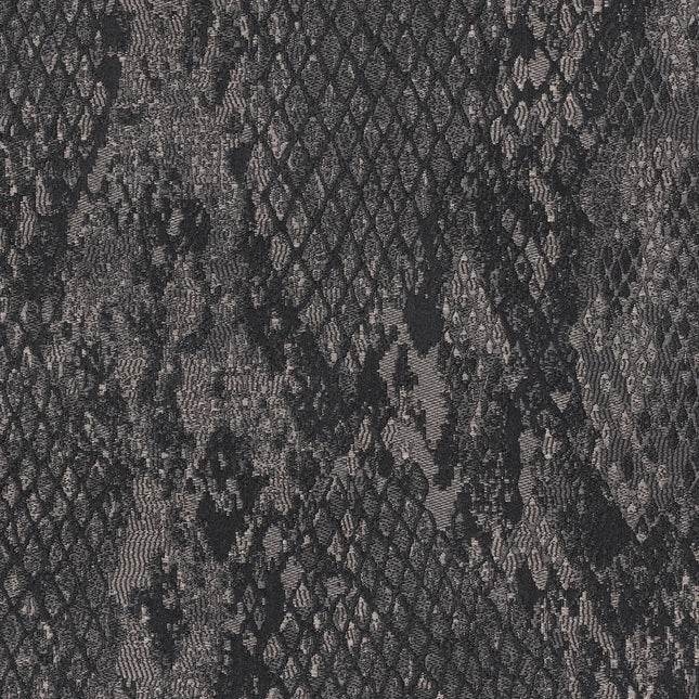 Kvadrat - Sahco - Ozi - 180 fabric with snakeskin pattern in dark tones, highlighting textured jacquard design and tonal variations.