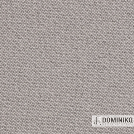 Minimalistische Gabriel Just stof met tweekleurig ontwerp, geïnspireerd op beton, gemaakt van gerecycled polyester, zacht en mat.