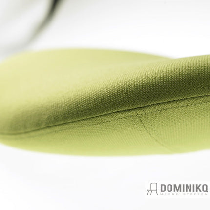 Close-up van groene bekledingsstof Fighter met linnenachtige structuur in moderne tint.