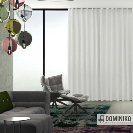 Alt Tag: Unieke gordijnstof Ritu met wilde zijdelook en tweekleurig structuureffect in moderne woonkamer. Vanaf 5 meter 10% korting.