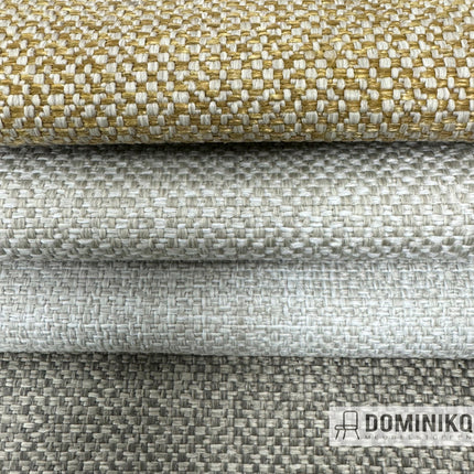 Renew meubelstoffen van Keymer in diverse kleuren, bekend om duurzaamheid, slijtvastheid en OEKO-TEX-certificering. Drie opgerolde stoffen.