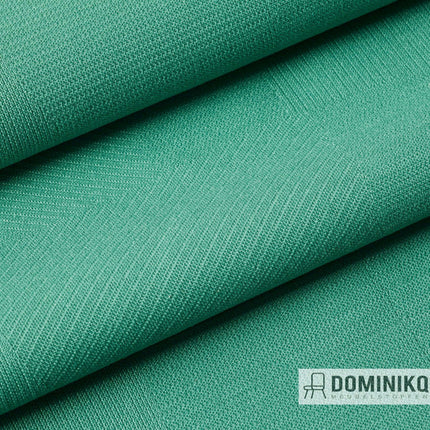 Sone bekledingsstof van Kvadrat in groene tint, kenmerkend door subtiele grafische ontwerpen met kruistekstuurtjes, geschikt voor veelzijdig gebruik.