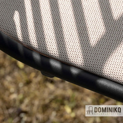 Close-up van duurzame Patio Outdoor stof met levendige kleuren geschikt voor tuinmeubilair, waterafstotend en vlamvertragend.