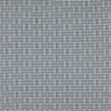 Gestippeld weefpatroon van Aristide's Lili gordijnstof in kleur 130 Ash, geschikt voor diverse oppervlaktes, patroonmaat 3 cm x 3 cm.