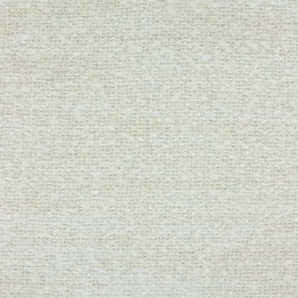 Textuur van Aristide Lune 200 Pearl gordijnstof in zandkleurige tint met pluizige, semi-transparante uitstraling.