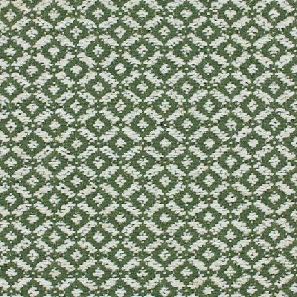 Klassieke groene meubelstof Varga van Aristide met subtiel geometrisch patroon, geschikt voor elegante interieurs.