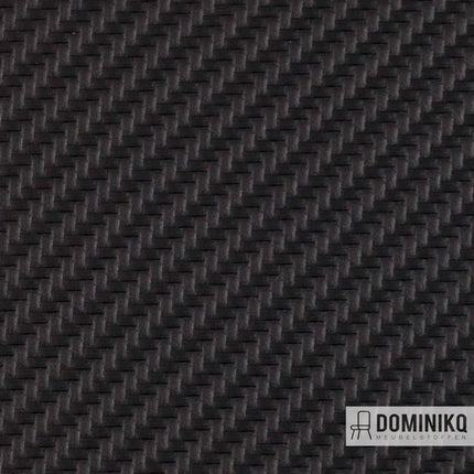 Anthraciet carbon fiber kunstleer van Vyva Fabrics, geschikt voor luxe auto-interieurs en meubels. Deel van de Marine Collectie.