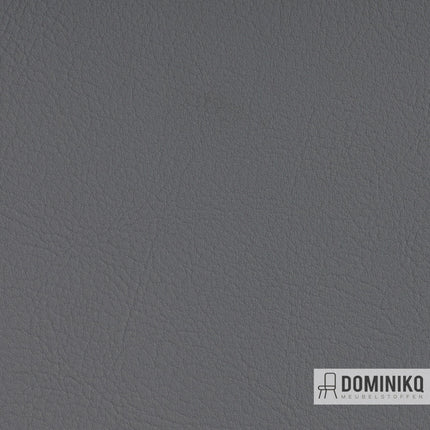 Grijze luxe kunstleer textuur van Vyva Fabrics Valencia, ideaal voor interieurtoepassingen, biedt slijtvastheid en brandveiligheid.