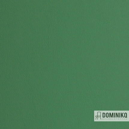 Groene Viper kunstleer van Vyva Fabrics met subtiele Nubuck textuur, brandveilig en slijtvast. Geschikt voor diverse interieurtoepassingen.
