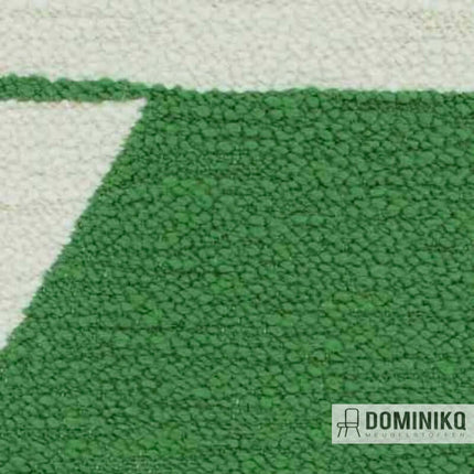 Groene en witte meubelstof van Aristide's Agape collectie met grafisch patroon en bouclé textuur.