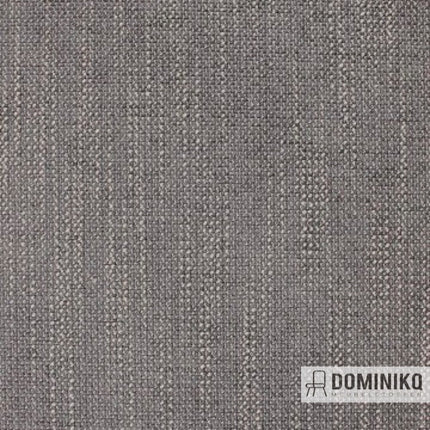Grijze meubelstof uit de Aristide Atom-collectie, vlekbestendig en brandvertragend, met ton-sur-ton weving.