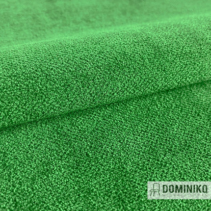 Groene meubelstof Amara van Casal met subtiel reliëf en dikke garens, ideaal voor veelzijdige interieurtoepassingen.