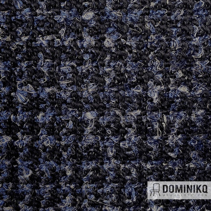 Close-up van Casal Aiguille 15 Crépuscule, woonstof met grove bouclé uitstraling in blauw en zwart, geschikt voor gordijnen en meubels.