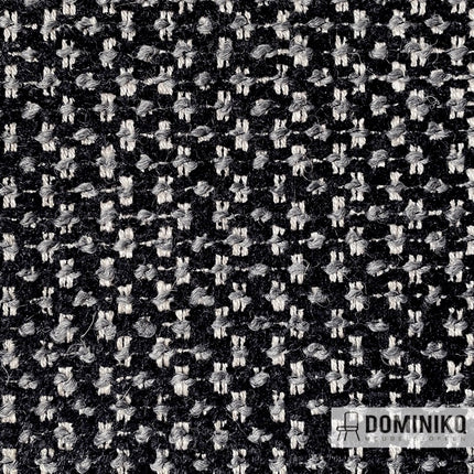 Donkergeweven meubelstof met lichtere stipjes van Lande, gemaakt van katoen, rayon, wol en kunstvezels, OEKO-TEX gecertificeerd.