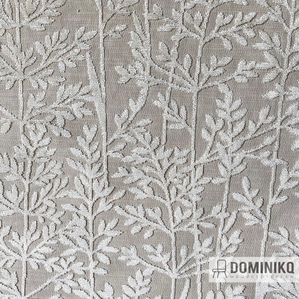 Veelkleuren stof met witte blaadjesprint op ivoorkleurige achtergrond van Casal, geschikt voor decoratie, meubels en gordijnen.