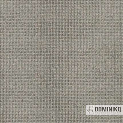 Szary Gabriel Fame Tkanina meblowa o jedwabistym wykończeniu, odpowiednia do organicznych kształtów, z logo Dominiko w narożniku.