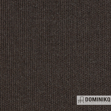 Donkerbruine meubelstof uit Keymer Spectrum collectie met grove structuur en robuuste uitstraling.