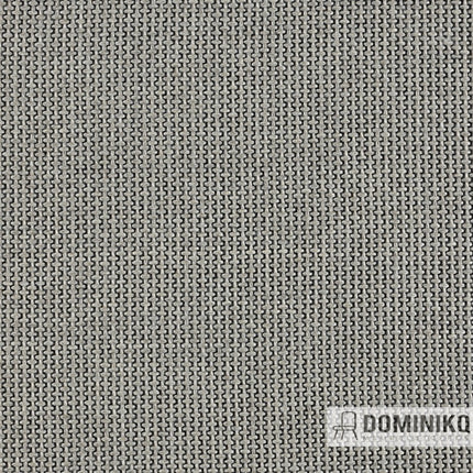 Detail van Keymer Spectrum meubelstof met grove structuur in grijze tint, onderdeel van Europese design stoffencollectie.