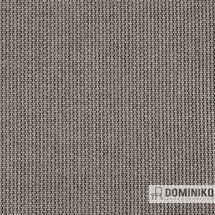 Grove meubelstof Spectrum van Keymer met zichtbare weefstructuur in neutrale kleur, benadrukt door zwart onderdraad.