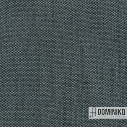 Detail van Kvadrat Raf Simons Sunniva 3 stof in rijke blauwe tinten met complexe structuur.