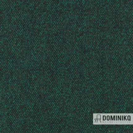 Groene meubelstof "Vanir" door Raf Simons voor Kvadrat, geïnspireerd door militaire jassen, met bouclé garens en verfijnde techniek.