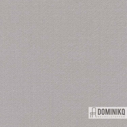 Grijze meubelstof Kvadrat Vidar 4 met twee geweven lagen, geschikt voor kleurrijke interieurontwerpen door Raf Simons.