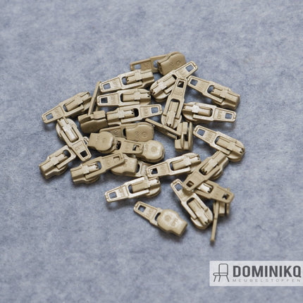 Beige ritsen op een rol van 25mm, ideaal voor op maat gemaakte kussens en moderne meubels. Geschikt voor Moroso en Artifort projecten.