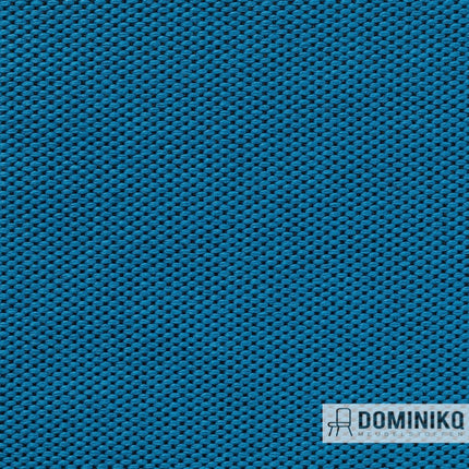 Matte blauwe stoffering Vescom Wilson 7067.15, veelzijdig en zacht met richtingloze structuur, ideaal voor kleurrijke accenten.